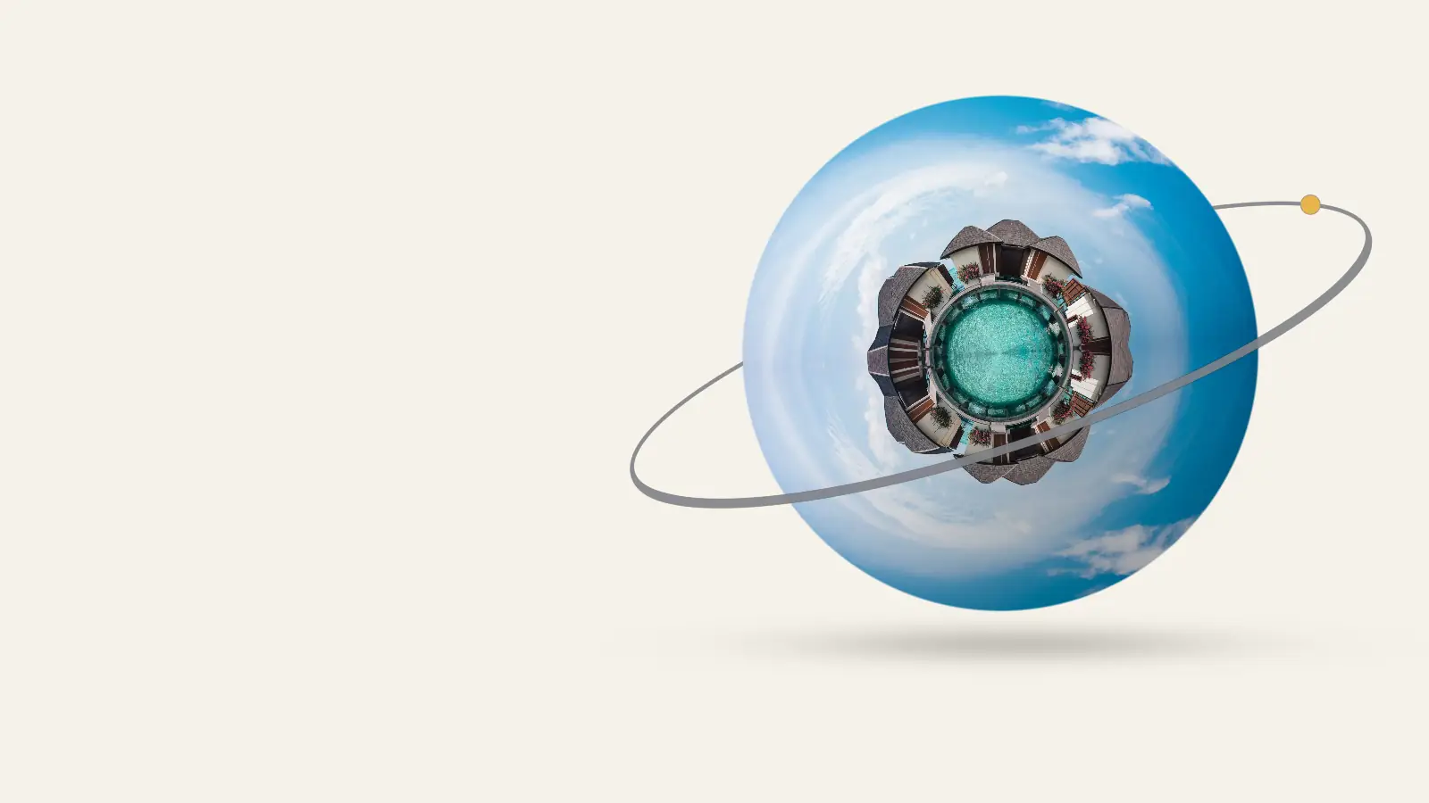 A little planet made from a photograph of Maldives water villas, circled by a grey orbit ring, floating on cream paper