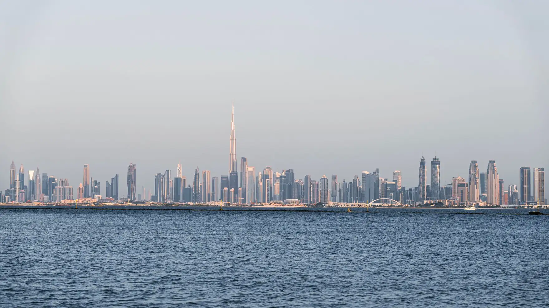 A stunning view of Dubai's skyline featuring Burj Khalifa across the sea