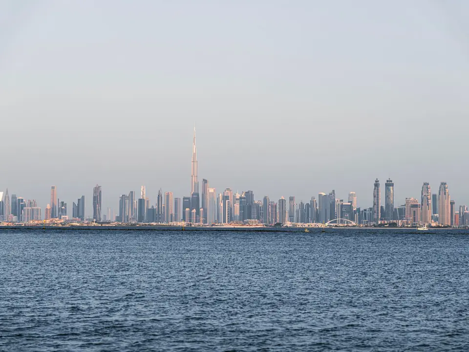 A stunning view of Dubai's skyline featuring Burj Khalifa across the sea