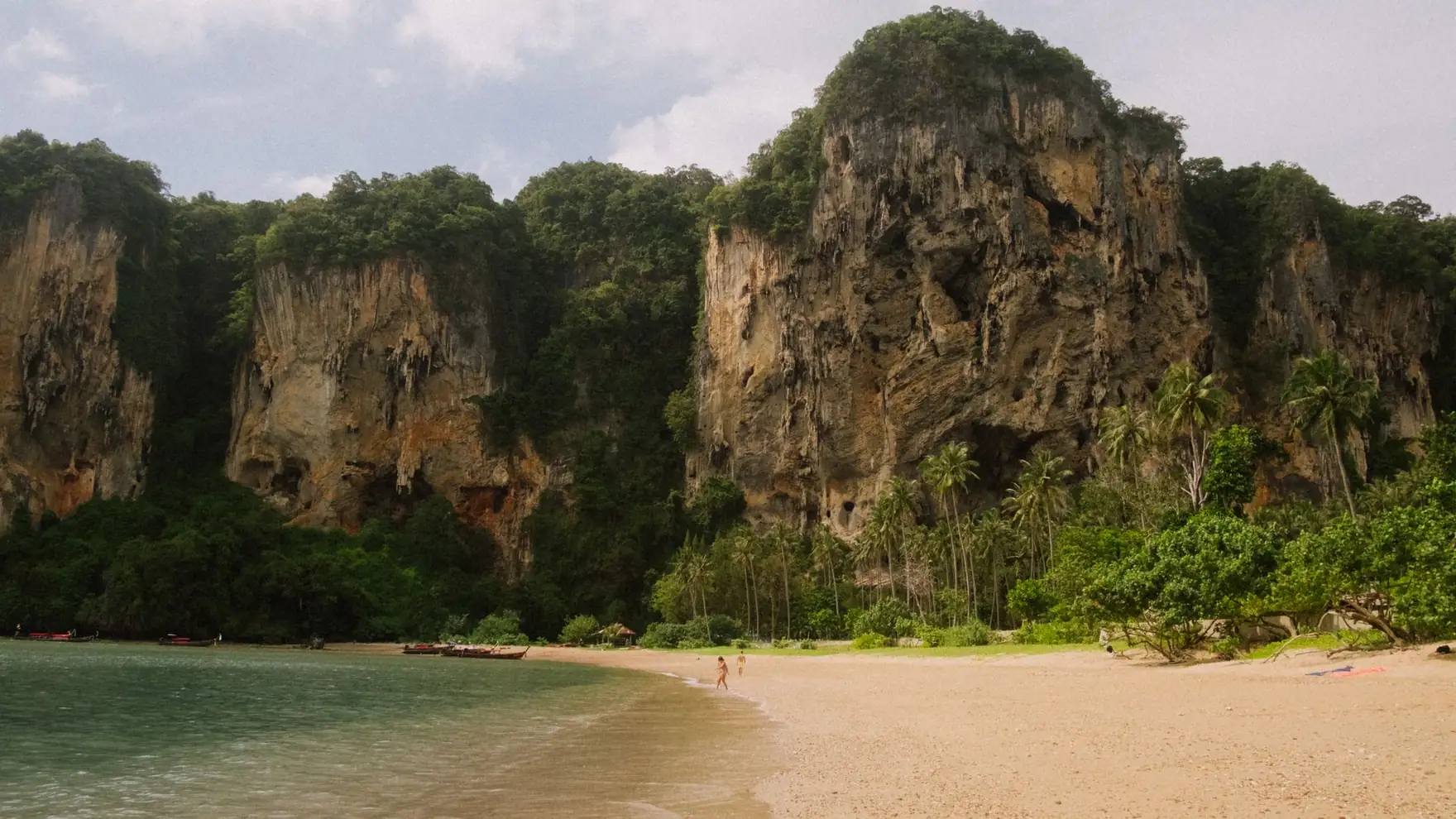 Explore the breathtaking cliffs and sandy beach of Ton Sai, Krabi