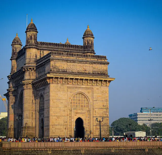 The iconic Gateway of India in Mumbai, a popular tourist attraction and historical landmark, on a sunny day