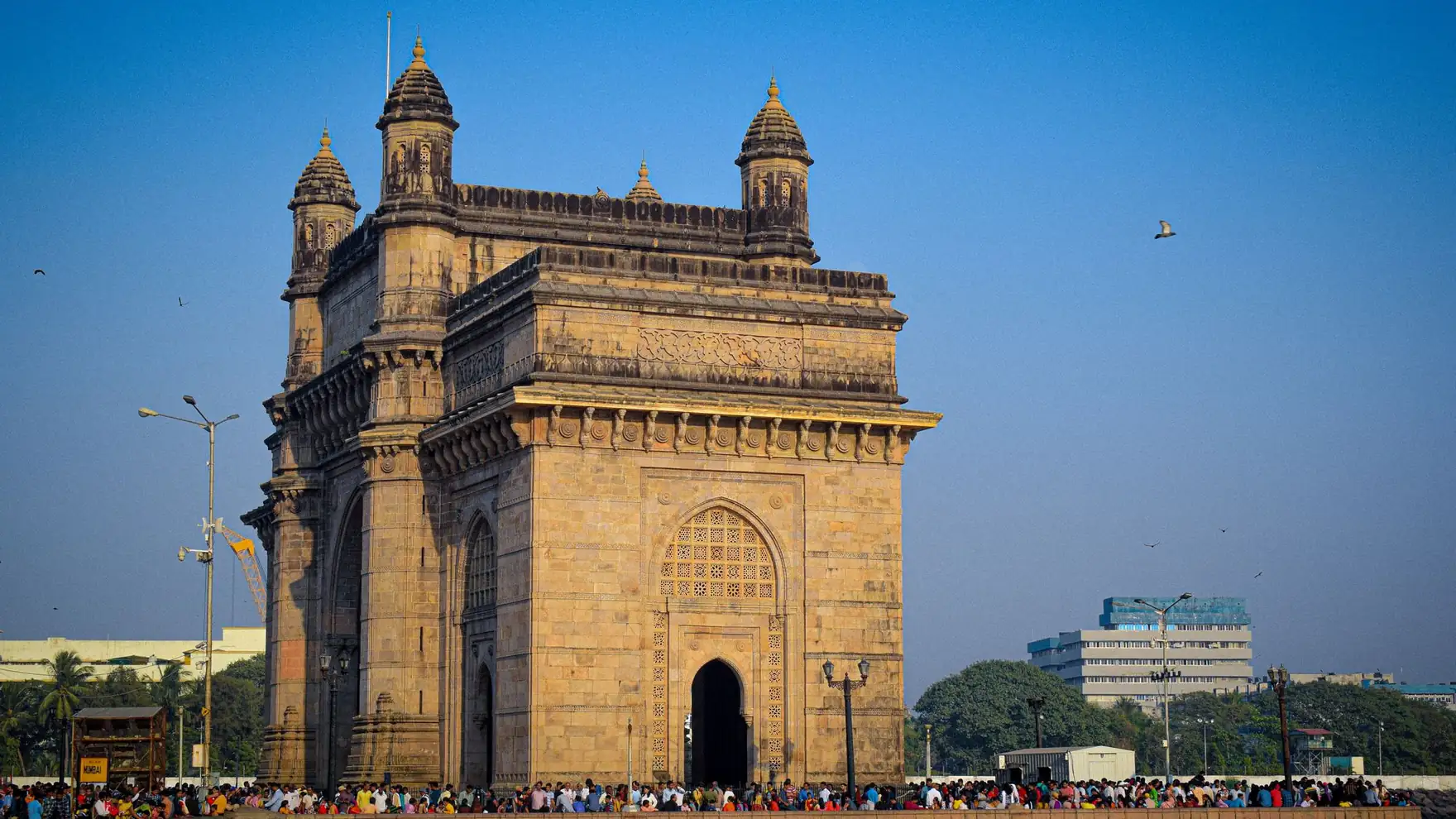 The iconic Gateway of India in Mumbai, a popular tourist attraction and historical landmark, on a sunny day