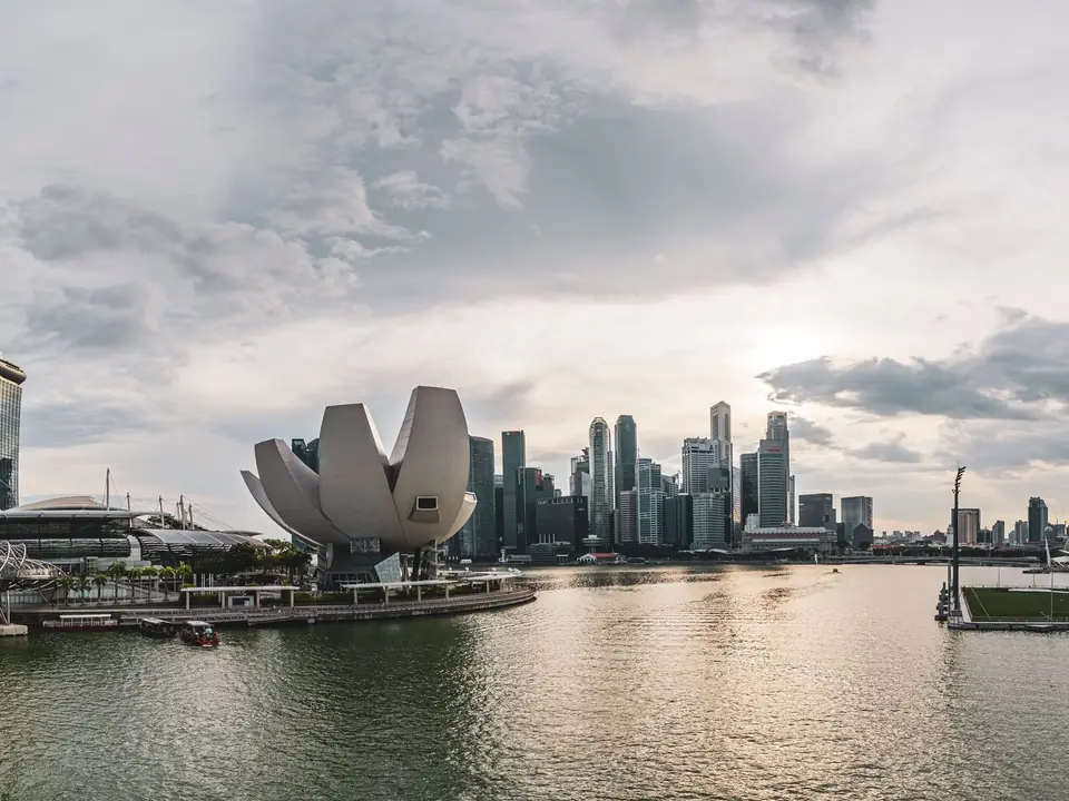 Panoramic view of Singapore skyline featuring modern architecture along the waterfront