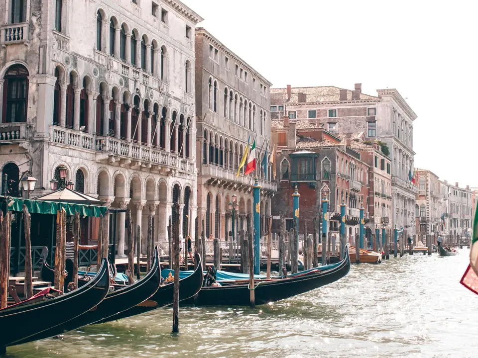 Scenic view of gondolas moored along the historic Grand Canal in Venice, Italy